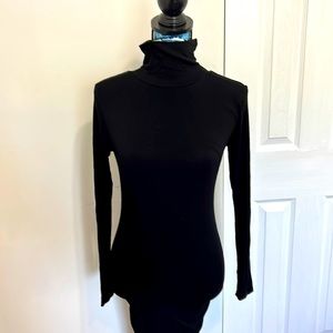 High neck dress with long sleeves. Never been worn but without tags